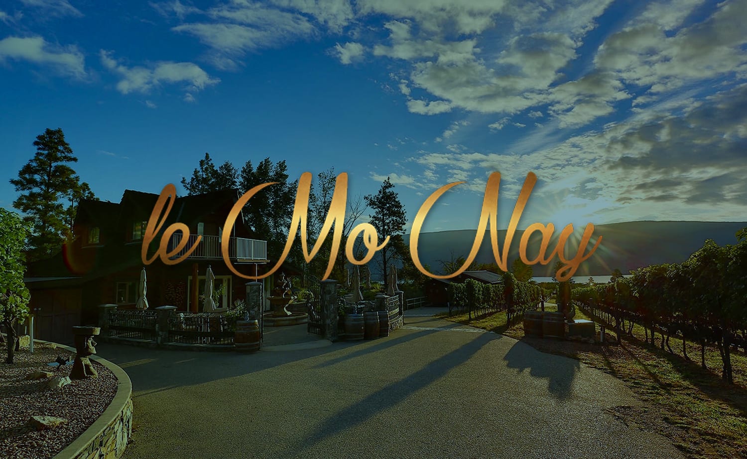 title "le mo nay" with an orchard and winery displayed in the background